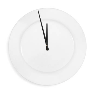 Bord met wijzers op te laat of net op tijd