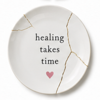 Wit bord met tekst healing takes time en gouden kintsugi lijnen bij scheiding in Bergambacht