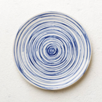 Bord met blauwe spiraal als beeld bij scheiding in Norg
