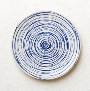 Bord met blauwe spiraal als beeld bij scheiding in Norg