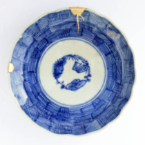 Antiek blauw bord met gouden herstel bij scheiden in Okkenbroek